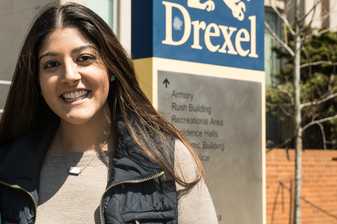 Elina smiling in front of Drexel building